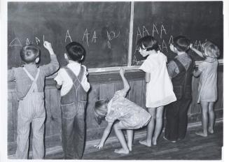Children at Blackboard. Lake Dick Project, Arkansas