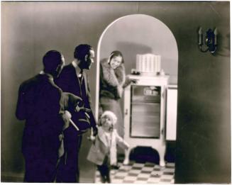 Advertisement: Woman Pointing at Refrigerator