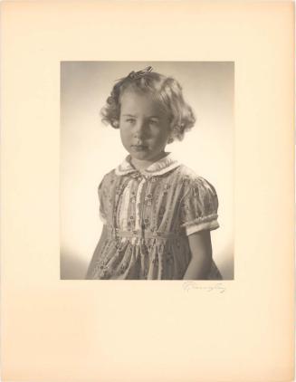 Portrait of girl wearing a collared dress